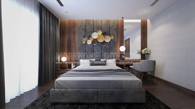 Gương ốp tường hình chữ nhật đơn giản nhưng lại đẹp mắt trong phòng ngủ hiện đại sử dụng sắc xám chủ đạo. Thiết kế chung cư